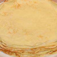 Hiomemade Blintzes (Russian Style Pancakes) · blintzes with served with a side of European style jam and sour cream