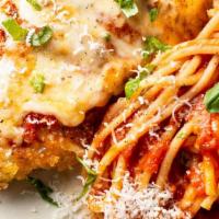 Chicken Parmigiana · Pasta of your choice with Crispy breaded Chicken smothered with parmesan cheese and tomato s...