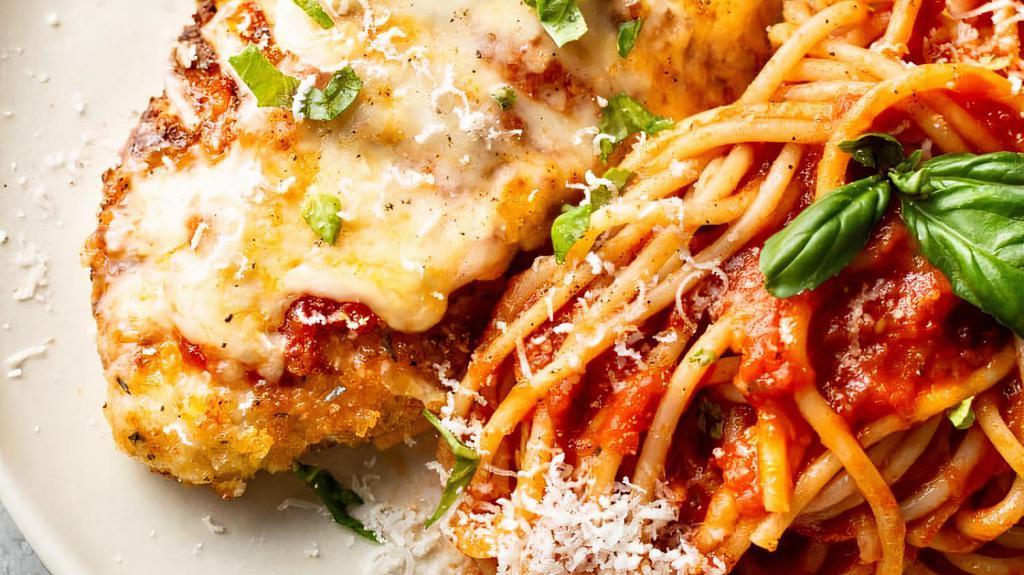 Chicken Parmigiana · Pasta of your choice with Crispy breaded Chicken smothered with parmesan cheese and tomato sauce.