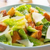 Caesar Salad · Romaine lettuce, shredded Parmesan cheese, croutons.