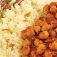 Veggie Stew · Stewed garbanzo beans served with rice, salad and sauces.