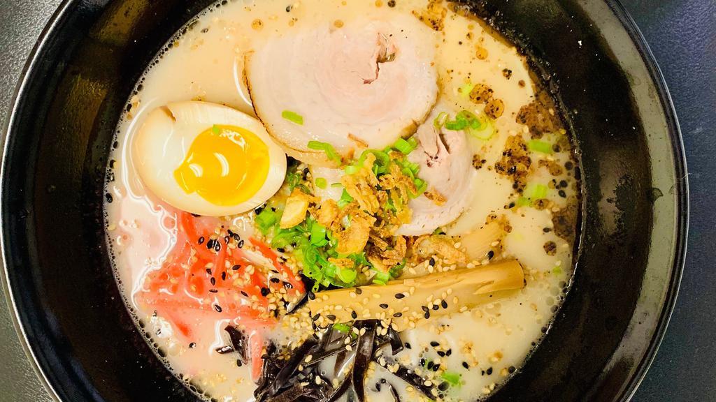 Tonkatsu · (Pork Broth)
Toppings: Pork, Egg, Ginger, Bamboo Shoots, Sesame Seed, Mushroom, Fried Onion, Dry Seaweed, Green Onion.
