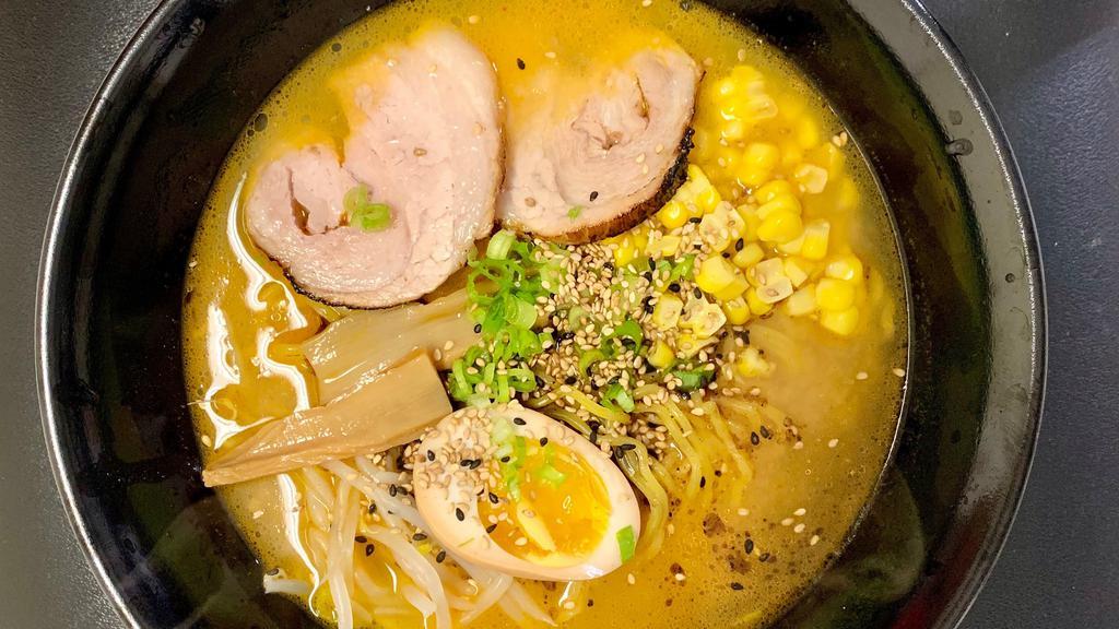 Miso Ramen · (Sesame + Soybean Paste)
Toppings: Pork, Egg, Bamboo Shoots, Sesame Seed, Bean Sprout, Corn, Fried Onion, Dry Seaweed, Green Onion.