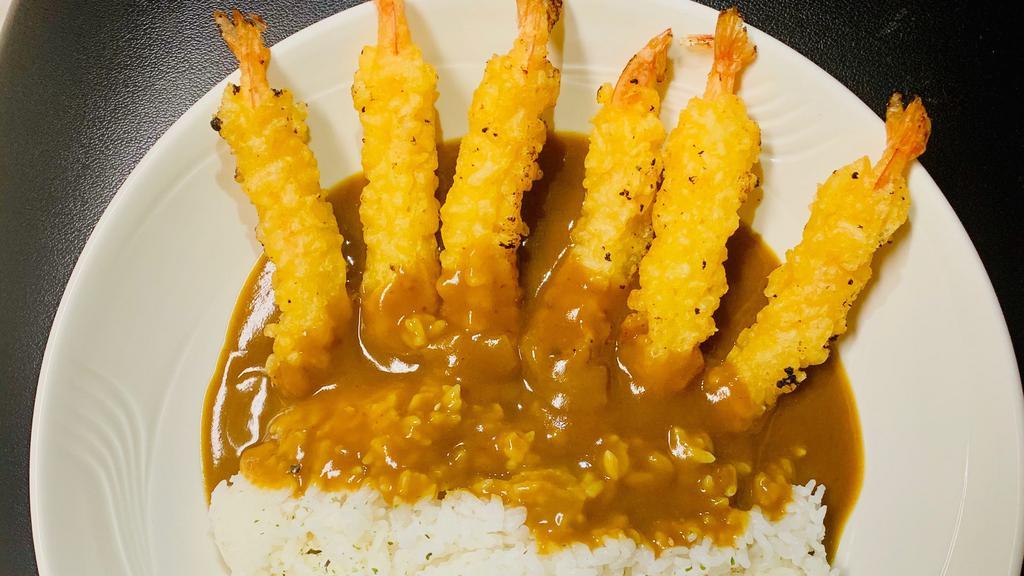 Shrimp Tempura Curry · 6 Piece Shrimp Tempura, Rice, Sesame Seed and Curry Sauce.