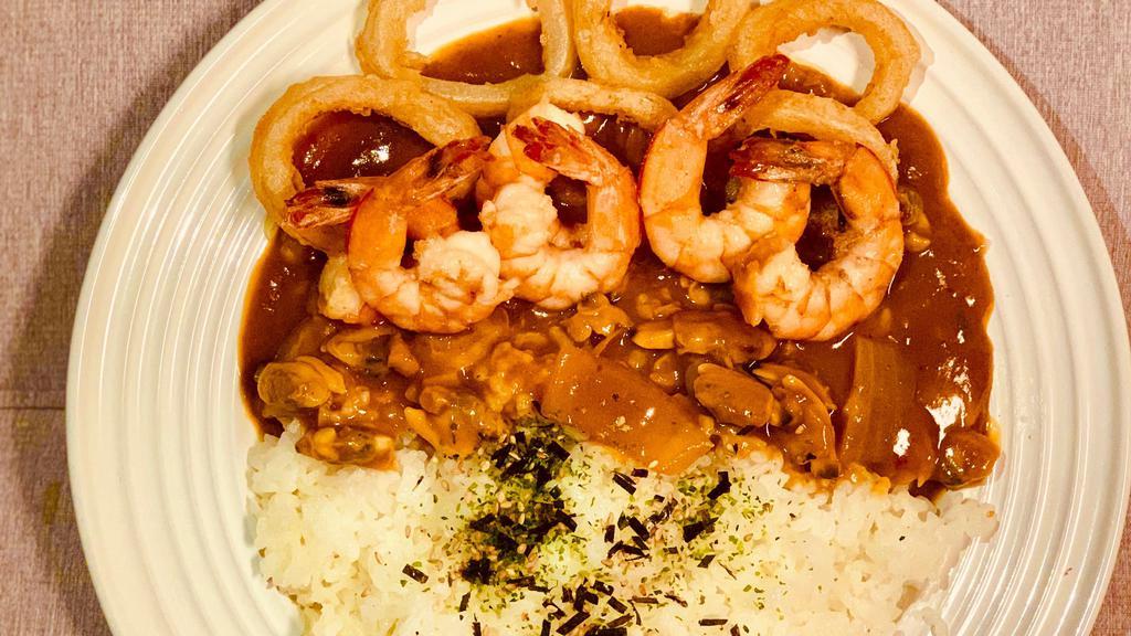 Shrimp, Clam, Fried Squid Curry · Shrimp, Clam, Fried Squid, Rice, Sesame Seed and Curry Sauce.