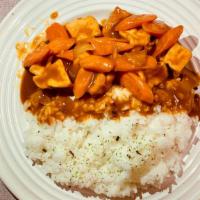 Tofu Carrot Curry · Fried Tofu (Steamed Option Available), Steamed Carrot, Rice, Sesame Seed and Curry Sauce.