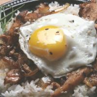 Sukiyaki Bowl · Thin sliced chicken or beef stir-fry with caramelized onions a tasty fried egg on top.