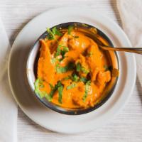 Chicken Tikka Massala · Barbecued chicken breast cooked with onion, tomato, nuts, spices and rich creamy sauce.