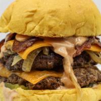 Chubbys Deluxe · Double cheddar cheese, double beef patty, grilled onion, pickles, fry sauce