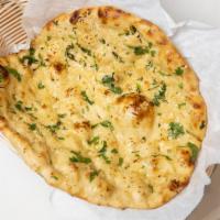Garlic Naan Better · Indian grilled bread made of white flour, and slathered with garlic and butter.