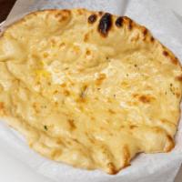 Second To Naan · Indian bread made of white flour and roasted in traditional grills.