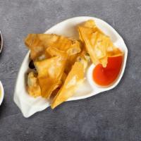 Crab Cheese Wonton · (5 Pieces) Golden fried wontons stuffed with real crabmeat and cream cheese filling, served ...
