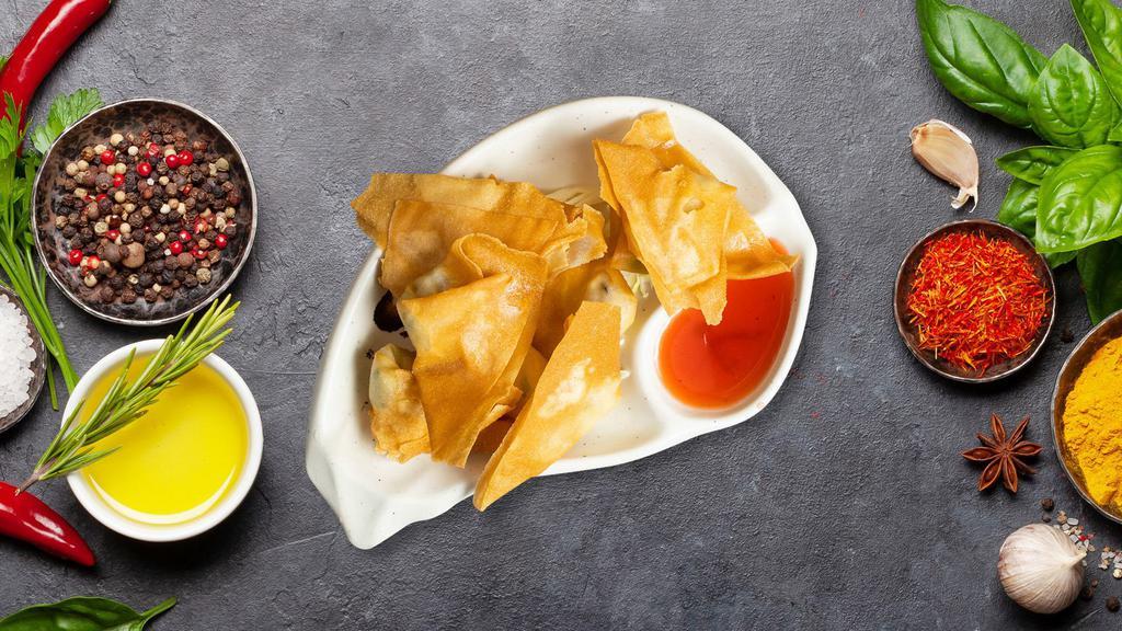 Cream Cheese Wontons · (5 Pieces) Golden fried wontons stuffed with cream cheese filling, served with house-made sweet and sour sauce.