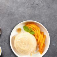 Mango With Sticky Rice · Delicious thai sticky rice paired with seasonal mango and condensed milk.