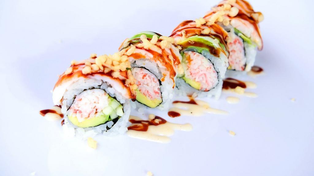 Tiger Roll · In: crab meat, avocado, cucumber. Out: shrimp, avocado, sweet, white sauce, crunch.