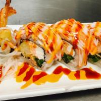 The Lion King · In;Shrimp Tempura,crab meat,cream cheese,jalapenos
Out: Shredded Crab stick w/spicy mayo,sweet