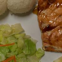 Salmon Teriyaki Plate · Grilled salmon with house-made teriyaki sauce, side salad and rice.