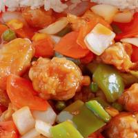 Sweet And Sour Shrimp · Sweet and sour shrimp served with steamed veggies and jasmine rice.