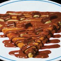 Kinder Crepe · Crepe loaded with kinder sauce and topped with kinder chocolate bar.