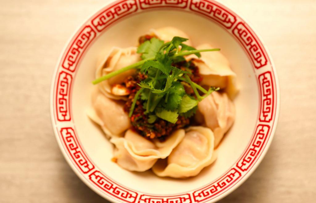 Housemade Wontons In Sichuan Chili Oil (8) · Spicy. Steamed pastry, spice-infused pork, Napa cabbage, sichuan ma lah chili oil sauce.