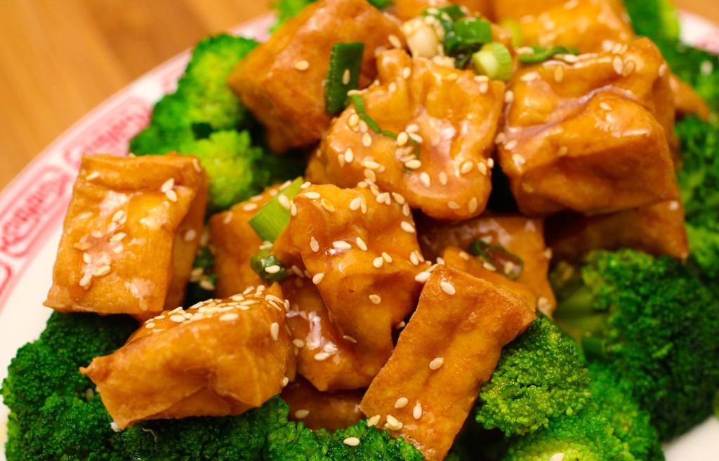 Sesame Tofu · Spicy. Fried tofu, broccoli, sesame seeds, garlic, ginger, chili house sauce.