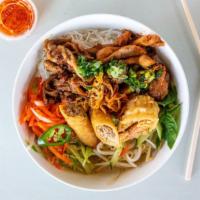 #19. House Special Noodle (Bun Tom Thit Nuong Cha Gio) · Combination of grilled pork, chicken, shrimp, egg roll, Bean sprouts, lettuce , pickled carr...