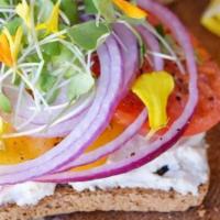 Heirloom Tomato Toast · two slices of organic, vegan and gluten 
free toast topped with housemade herb probiotic cas...