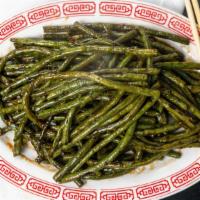 Sichuan Style Long Beans · Long beans stir-fried with garlic, ginger, sichuan pepper, and soy sauce.