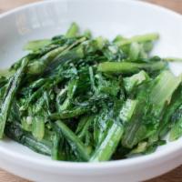 Sauteed Chinese Greens · Seasonal Chinese greens sauteed with ginger and garlic.