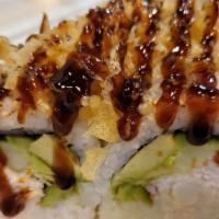 Crunchy Roll · Inside: shrimp tempura, crab meat, cucumber, avocado crunchy on top with eel sauce.