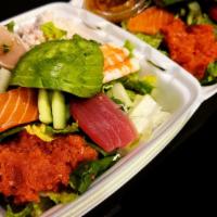 Sashimi Salad · salmon, tuna, albacore, shrimp, spicy tuna, crab meat, cucumber and avocado with ginger soy ...