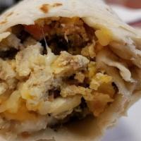 Breakfast Burrito · Served with scrambled eggs, cheese, pico de gallo, and your choice of salsa. you can also ad...