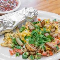 Spicy Mexican Scramble · Three scrambled eggs, peppers, cilantro, chopped tomatoes, onions, cheddar cheese, and salsa...