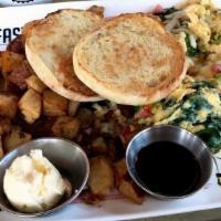 Veggie Scramble · Scrambled eggs, spinach, mushroom, onions, potatoes, and cheddar cheese served with corn or ...