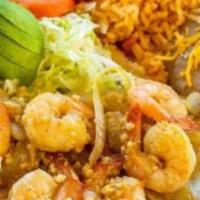 Shrimp · Cooked with butter, onion, bell peppers, tapatio sauce, medium spicy and rice inside.