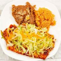 Two Cheese Enchiladas · Served with Rice and Refried Beans (No substitutions.)