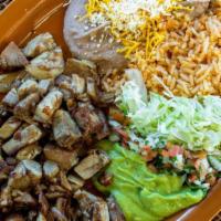 Carnitas · Pork, with Lettuce, guacamole and salsa mexicana. Served with Rice and Refried Beans. 3 Corn...