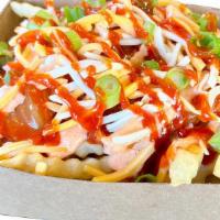 Kickin' Kimchi Fries · Crinkle cut fries topped with fresh-roasted kimchi, spicy mayo, cheese, and green onions
