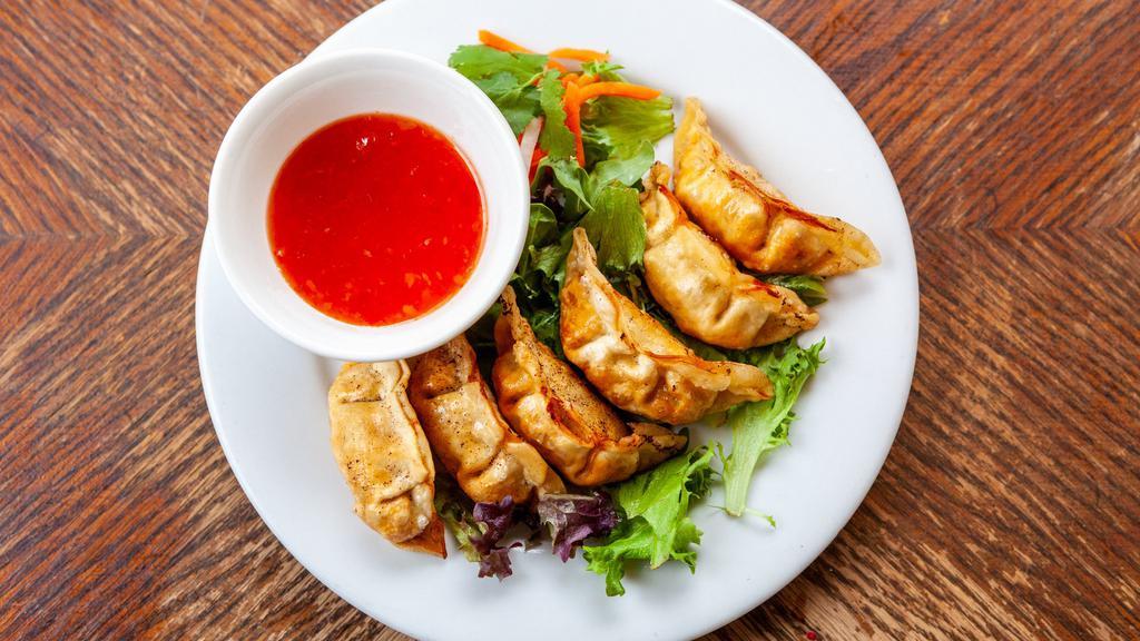 Potstickers · Six (6) chicken w/vegetable potstickers. Served with a side of sweet chili sauce.