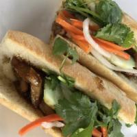 Banh Mi · Choice of chicken, pork, beef or totu. Topped with fresh vegetables and sauces are available...