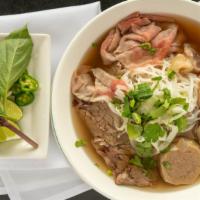 House Special Pho · Includes: steak, brisket, tendon, and meatballs.