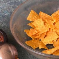 Chips & Salsa · Bag of chips and 4 salsas