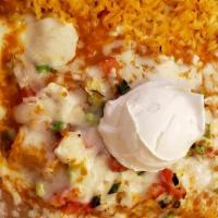 Enchiladas Rancheras · Two corn tortillas filled with your choice of chicken, picadillo, ground beef or cheese, top...