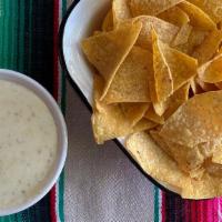 Jalapeno Queso · House-made queso sauce served with chips cooked in rice oil. (spicy) (vegetarian)