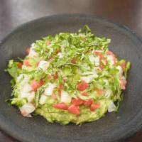 Large Guacamole · Made to order - fresh avocado, cilantro, lime, garlic confit, onion, tomato, and serrano chi...