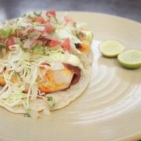 Baja Fish Tacos · Three Mahi Mahi tacos (your choice of grilled or fried), topped with cabbage, pico de gallo,...