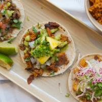 Mixed Taco Plate · One each of our chicken tinga, beef barbacoa, and pork carnitas tacos. Served with rice and ...