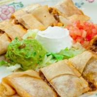 Chicken Taquitos · Deep fried flour tortilla filled with chicken or choice of meat and cheese topped with lettu...