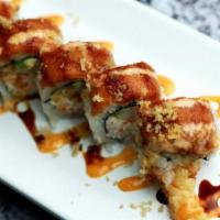 Red Dragon Roll · Spicy. In: crabmeat, shrimp tempura, avocado / out: spicy tuna, crunch, chili, eel sauce, sp...