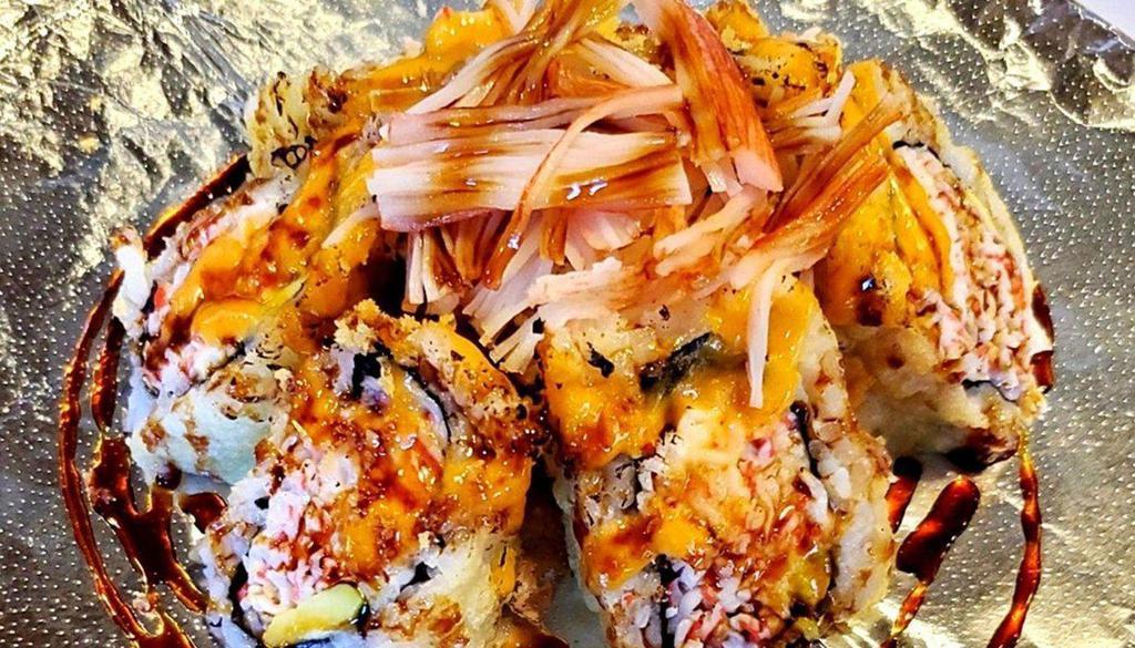 N.T. Roll · In: crabmeat, avocado / deep fried then topped with crunch, crab stick, eel sauce.